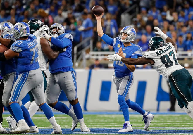 Detroit Lions quarterback Jared Goff passes against Philadelphia Eagles defensive tackle Javon Hargrave during the second half at Ford Field, September 11, 2022.