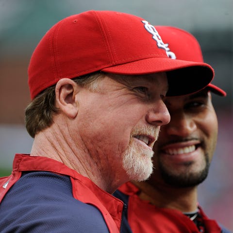 Mark McGwire and Albert Pujols during the 2011 Wor