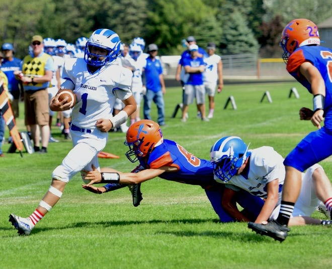 Sophomore quarterback Aidan Fenstermaker (1) rushed for three touchdowns and passed for another to lead the Inland Lakes Bulldogs, who picked up a conference win at Central Lake on Saturday afternoon.