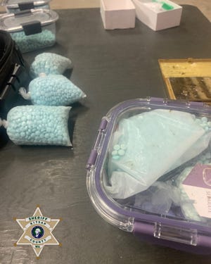 Blue pills -- suspected to contain fentanyl -- were among the drugs seized by Kitsap County sheriff's deputies from the traffic stop.