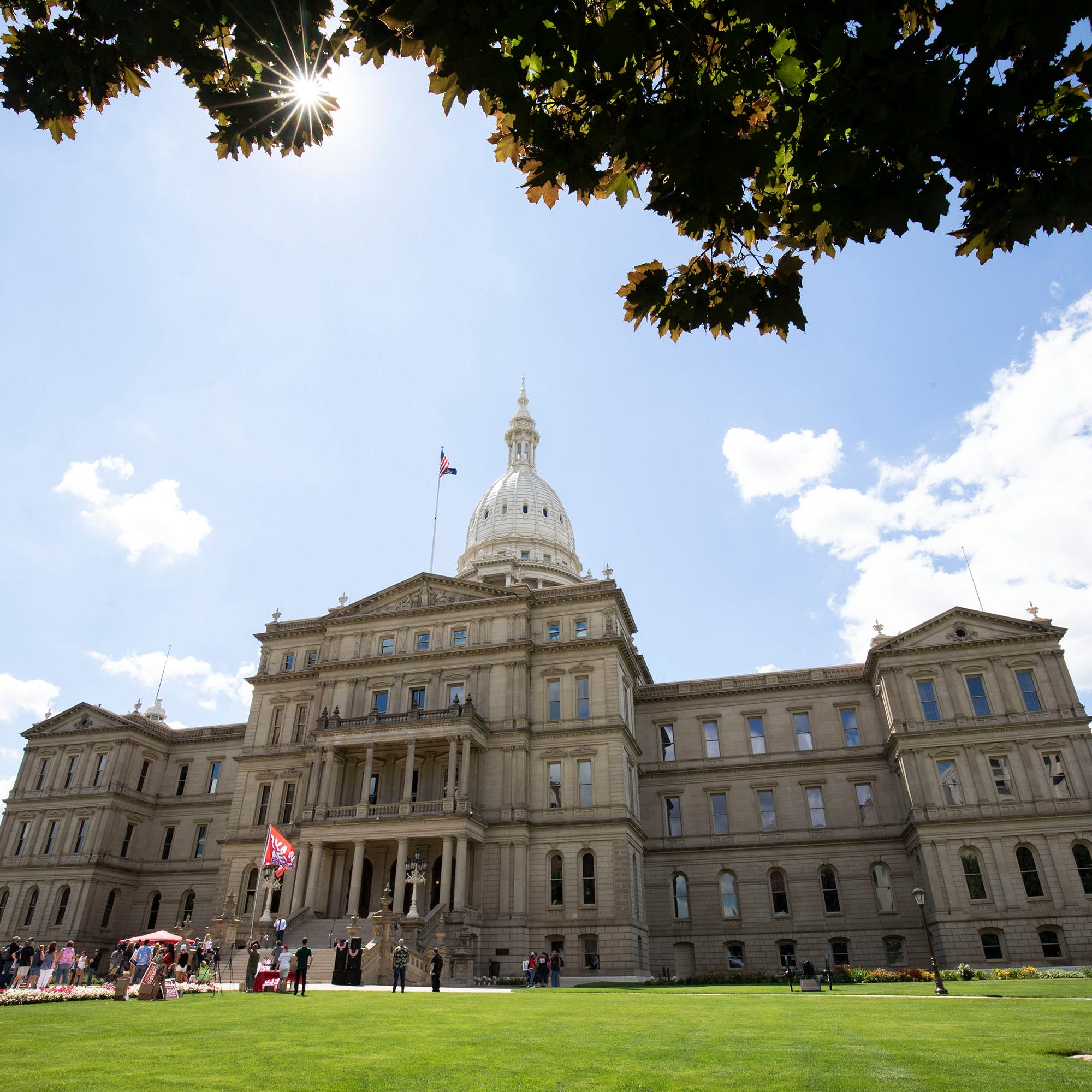 LANSING, MI - JULY 30: People attend a Rally The Vote event at the Michigan State Capitol on July 30, 2022 in Lansing, Michigan. The keynote speaker at the rally was Michigan Republican gubernatorial candidate Ryan Kelley, who has been charged with several misdemeanors related to the January 6 attack on the U.S Capitol. The Michigan Primary is August 2. (Photo by Bill Pugliano/Getty Images) ORG XMIT: 775849619 ORIG FILE ID: 1242206769