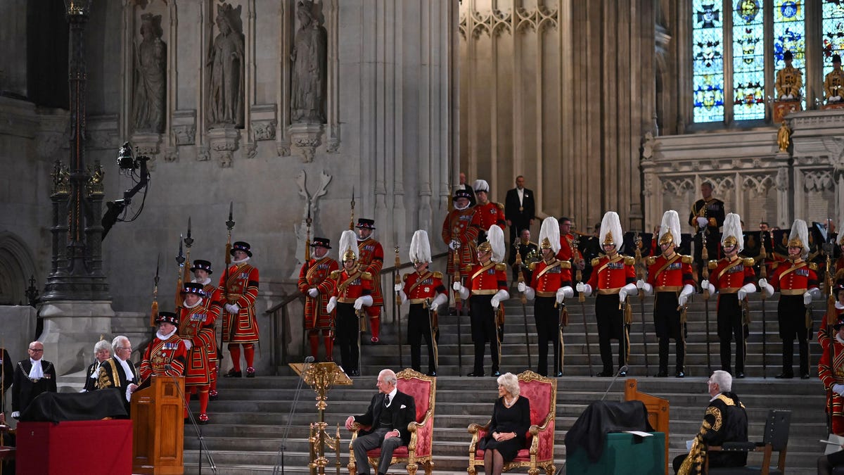 Britain's King Charles III and Britain's Camilla, Queen Consort listen as the Lord speaker, John McFall speaks during the presentation of Addresses by both Houses of Parliament in Westminster Hall, inside the Palace of Westminster, central London on September 12, 2022.