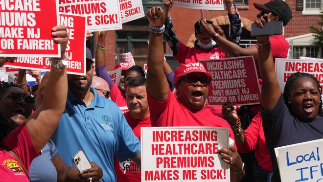 New Jersey public employees protesting to prevent a raise in the costs of their healthcare benefits that is to be voted on tomorrow.  The large protest took place outside the statehouse annex in Trenton, NJ on September 13, 2022.