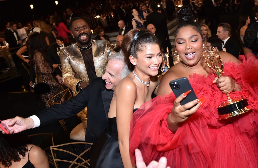 Zendaya, from left, and Lizzo, winner of the Emmy for outstanding competition program for "Lizzo's Watch Out For The Big Grrrls" at the 74th Emmy Awards on Monday, Sept. 12, 2022 at the Microsoft Theater in Los Angeles.