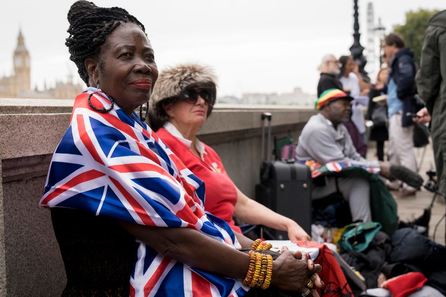 Ann (left) of Wales and Grace Gothard (right) of London are among the first to queue up for entry into Westminster Hall to see Her Majesty Queen Elizabeth lying in state.