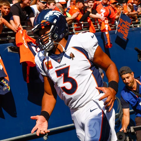 Denver Broncos quarterback Russell Wilson exits th