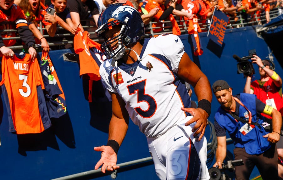 Denver Broncos quarterback Russell Wilson exits the locker room before pregame warmups against the Seattle Seahawks at Lumen Field.