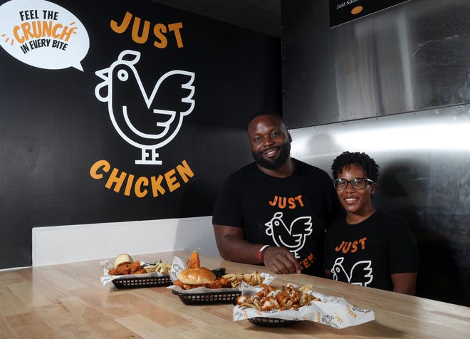 Co-owners D'Andre and A'Leah Martin are shown Sept. 14 at Just Chicken in Columbus' East Market. A second location is planned to open later this year at Bubbly Hall near New Albany.