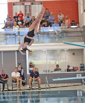 Coldwater's Charlotte Calhoun earned a spot in the MHSAA Dive Regional with a win versus Loy Norrix Tuesday
