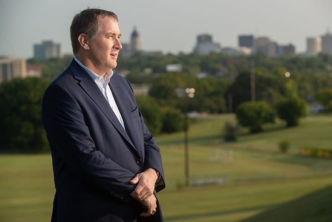 Stephen Wade, chosen Tuesday evening as Topeka's new city manager, stood Wednesday morning atop Quinton Heights hill.