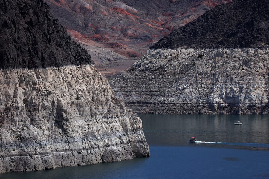 A bleached 'bathtub ring' is visible on the banks of Lake Mead near the Hoover Dam on August 19, 2022 in Lake Mead National Recreation Area, Arizona. Water levels at Lake Mead stand at 27 percent of capacity, its lowest level since being filled in the 1930s following the construction of the Hoover Dam. The lake's water levels have fallen an estimated 175 feet since 2000.
