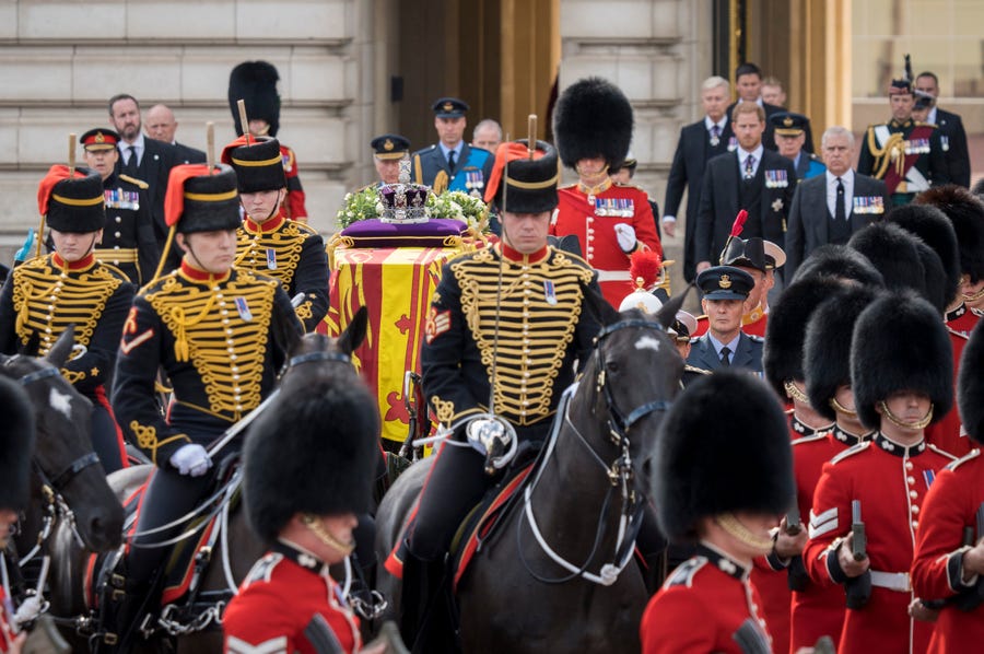 The coffin of Queen Elizabeth II leaves Buckingham Palace on a Gun Carriage, followed by King Charles III and other members of the Royal Family, en route to Westminster Hall on Sept. 14, 2022.