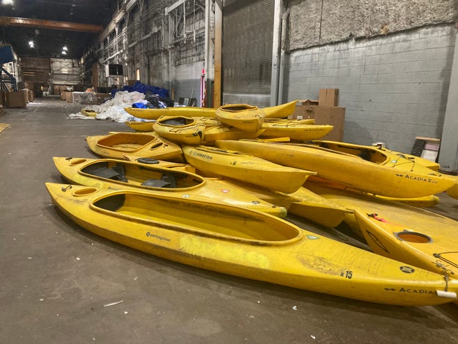 Kayaks discarded by a Pittsburgh-area rental company await processing at the HydroBlox plant in Meadville.