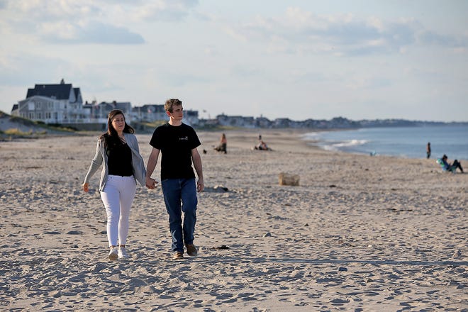 Valeriia Musiienko of Kyiv, Ukraine enjoys the ocean and Rexhame Beach with her partner, Derek Morrison, which she has been able to now that she has escaped the war in Ukraine and is living in Marshfield on Wednesday, Sept. 14, 2022.
