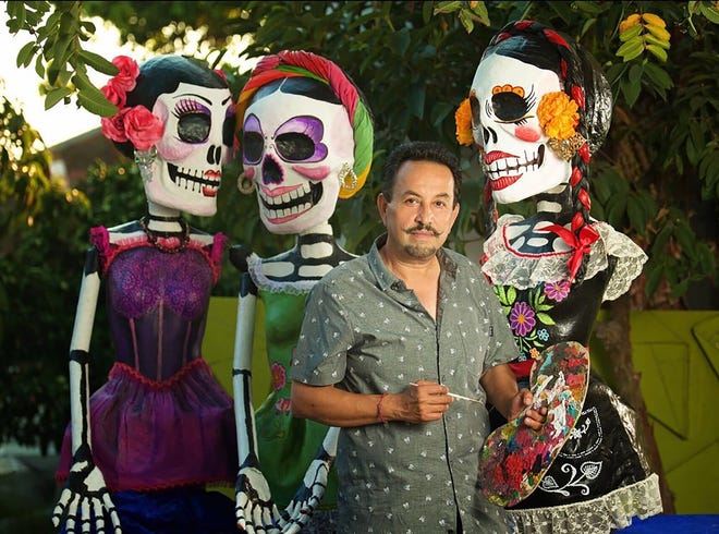 Artist Ricardo Soltero with his fiberglass sculptures of "La Calavera Catrina" coming to the Naples Botanical Gardens Oct. 1.