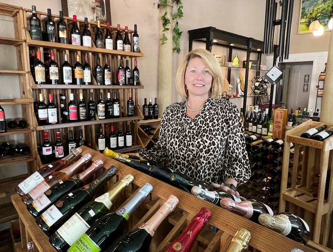 Syndee Isbell, honored as a Main Street Hero this year, is shown in her wine and gift shop, The Stone Market, in downtown Gadsden.