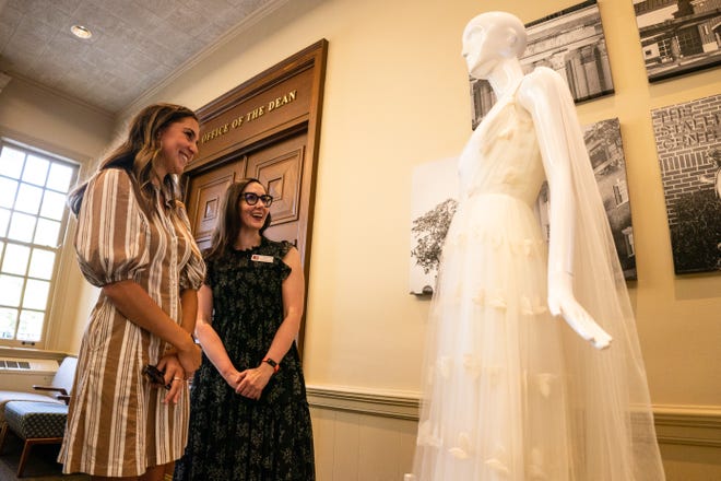 Sep 16, 2022; Tuscaloosa, AL, USA; Apparel design student Grace Federico talks with Babs Davis at the Drummond Lyon Hall reception in Doster Hall about her design honoring the women who inspired her Friday, Sept. 16, 2022. Mandatory Credit: Will McLelland-Tuscaloosa News