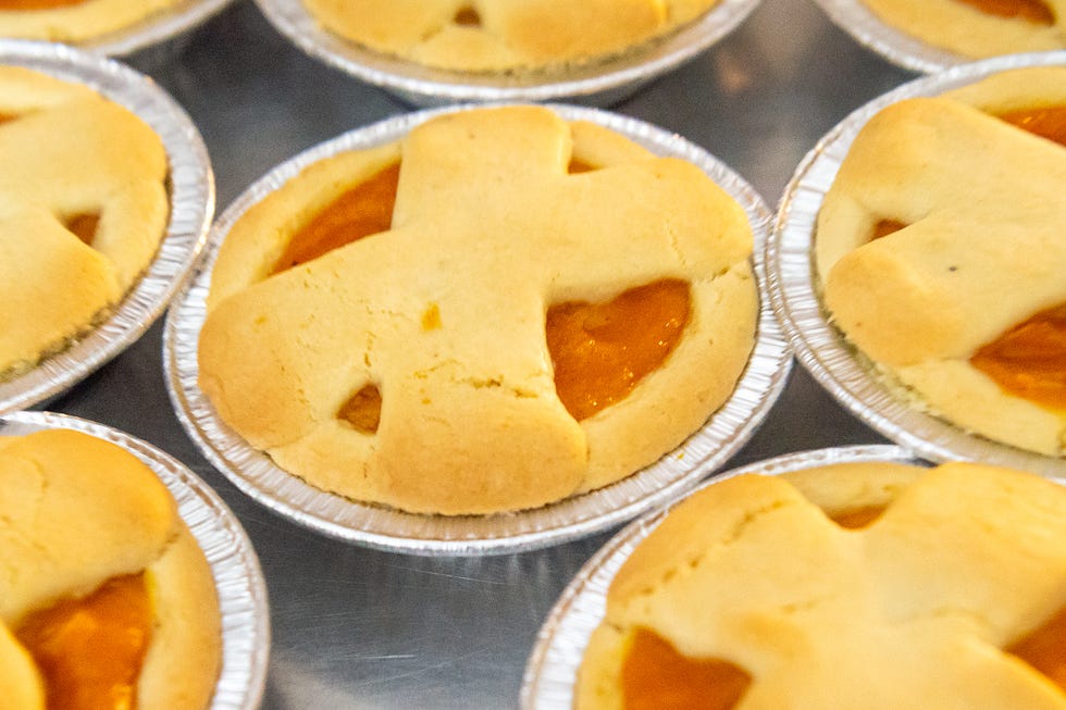 Lynore Harding, owner of Divine Cakes and Sweets Boutique, makes sweet dough pies Friday, Sept. 16, 2022.