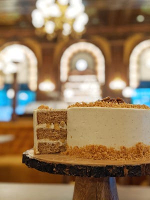Le Cavalier's French apple cider cake is a new menu staple this fall. Layer of apple cider infused cake are coated in a brown butter frosting with shortbread crumbs and pecans for garnish.