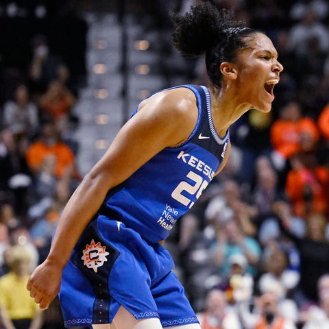 Alyssa Thomas reacts during the first half of the 
