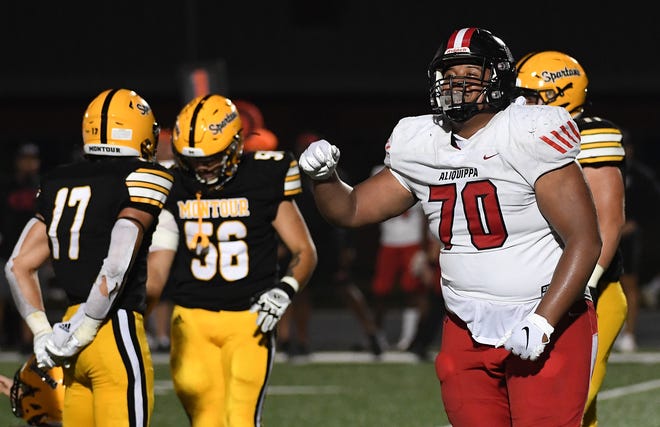 Naquan Crowder #70 of the Aliquippa Quips reacts after defensive stop in the second half during the game against the Montour Spartans at Thomas J. Birko Memorial Stadium on September 16, 2022 in McKees Rocks, Pennsylvania.