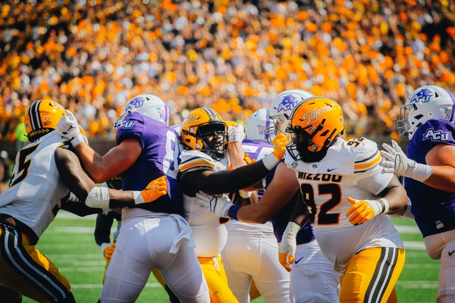 Missouri's Kristian Williams (92) fights through the offensive line during a game against Abilene Christian last Saturday at Faurot Field.