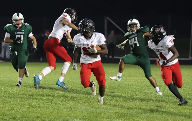 North Hagerstown's Van Spence returns a punt 67 yards for a touchdown during the Hubs' 26-15 win over Tuscarora on Sept. 16, 2022.