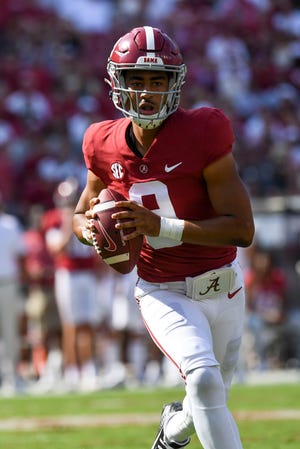 09/17/2022;  Tuscaloosa, Alabama, USA;  Alabama quarterback Bryce Young (9) rolls out as he looks for a receiver against Louisiana Monroe at Bryant-Denny Stadium.  Mandatory Credit: Gary Cosby Jr.-USA TODAY Sports
