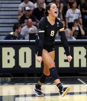Purdue Boilermakers Maddie Schermerhorn (8) celebrates after scoring during the NCAA women’s volleyball match against the Ball State Cardinals, Saturday, Sept. 17, 2022, at Holloway Gymnasium in West Lafayette, Ind. 