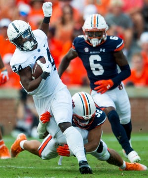 Penn State Nittany Lions running back Keyvone Lee (24) carries the ball as the Auburn Tigers take on the Penn State Nittany Lions at Jordan-Hare Stadium in Auburn, Ala., on Saturday, Sept. 17, 2022.