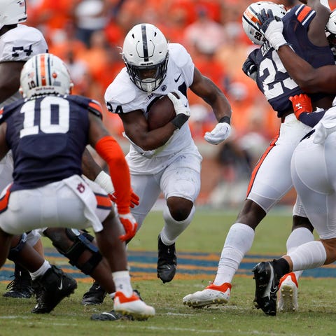 Penn State running back Keyvone Lee (24) finds a o
