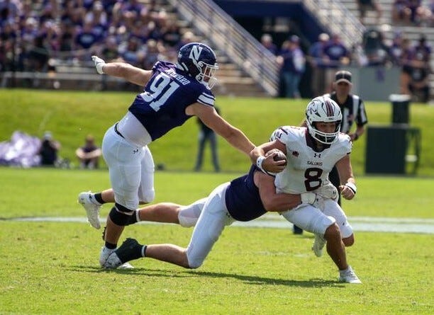 SIU quarterback Nic Baker (8), a 2018 Rochester High School graduate, finished with 241 yards and three touchdowns on 23-of-34 passing as Southern Illinois beat Northwestern 31-24 on Saturday in Evanston.