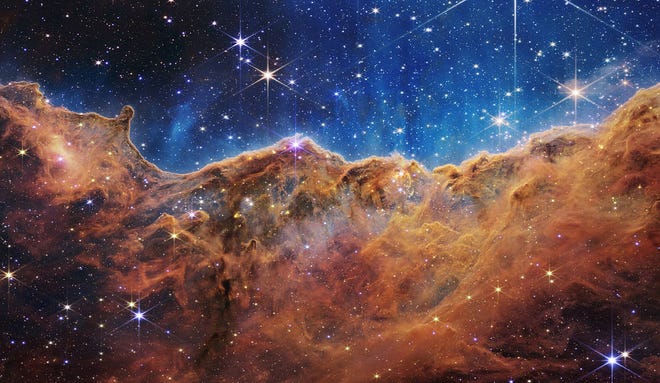 The Carina Nebula, 7,600 light-years away, as seen by the James Webb Space Telescope. This is one of the first five images NASA released on July 12.