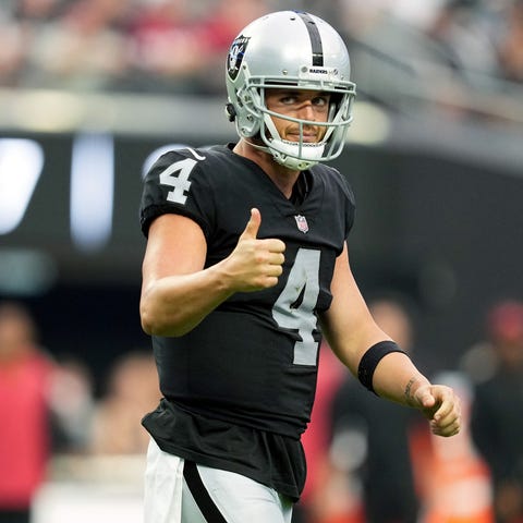 Derek Carr #4 of the Las Vegas Raiders reacts afte