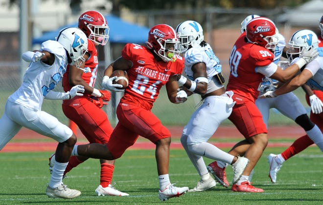Delaware State's Wade Inge runs against Virginia University of Lynchburg in the Hornets' 35-19 win in Dover Saturday.