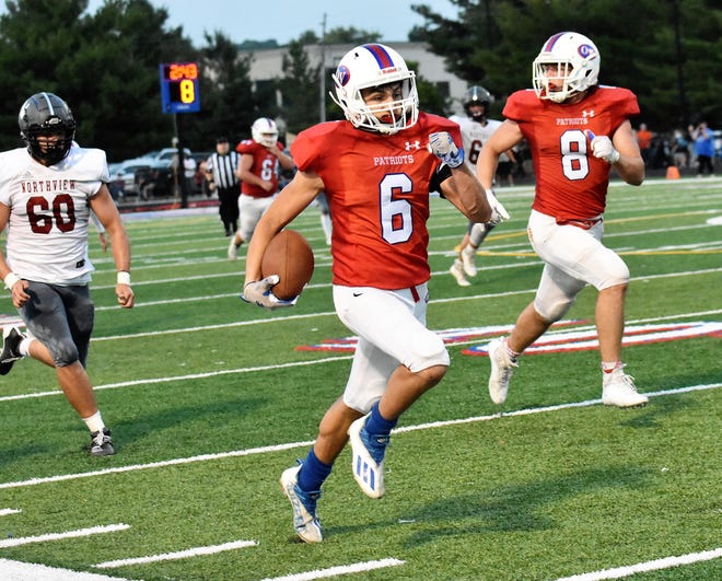 Owen Valley's Seth Brester charges down the sidelines, going 94 yards for the touchdown after his interception Friday night. See all the coverage of Friday night's game in today's Spencer Evening World.