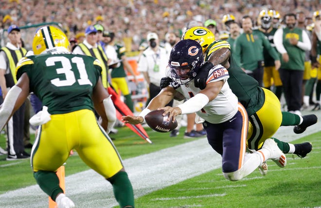 Chicago Bears quarterback Justin Fields is short of the end zone as he is tackled by Green Bay Packers linebacker Quay Walker in the fourth quarter.