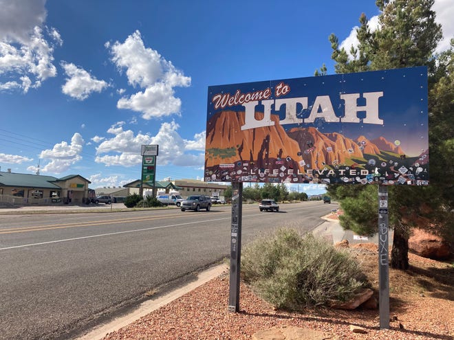 A sign welcomes motorists across the state line from Arizona to Utah where Colorado City and Hildale straddle the state line east of St. George.