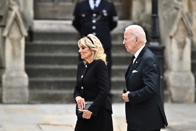 President Joe Biden (R) and first lady Jill Biden arrive at Westminster Abbey in London on Sept. 19, 2022, for Queen Elizabeth II's funeral.