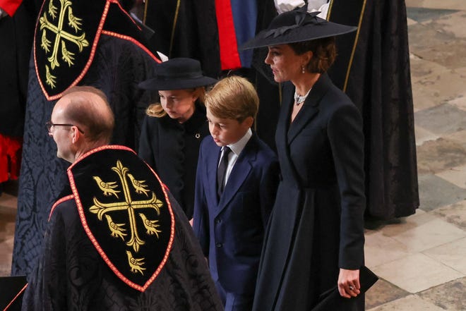 Catherine, Princess of Wales, Princess Charlotte and Prince George arrive for the State Funeral of Queen Elizabeth II at Westminster Abbey on Sept. 19, 2022 in London.