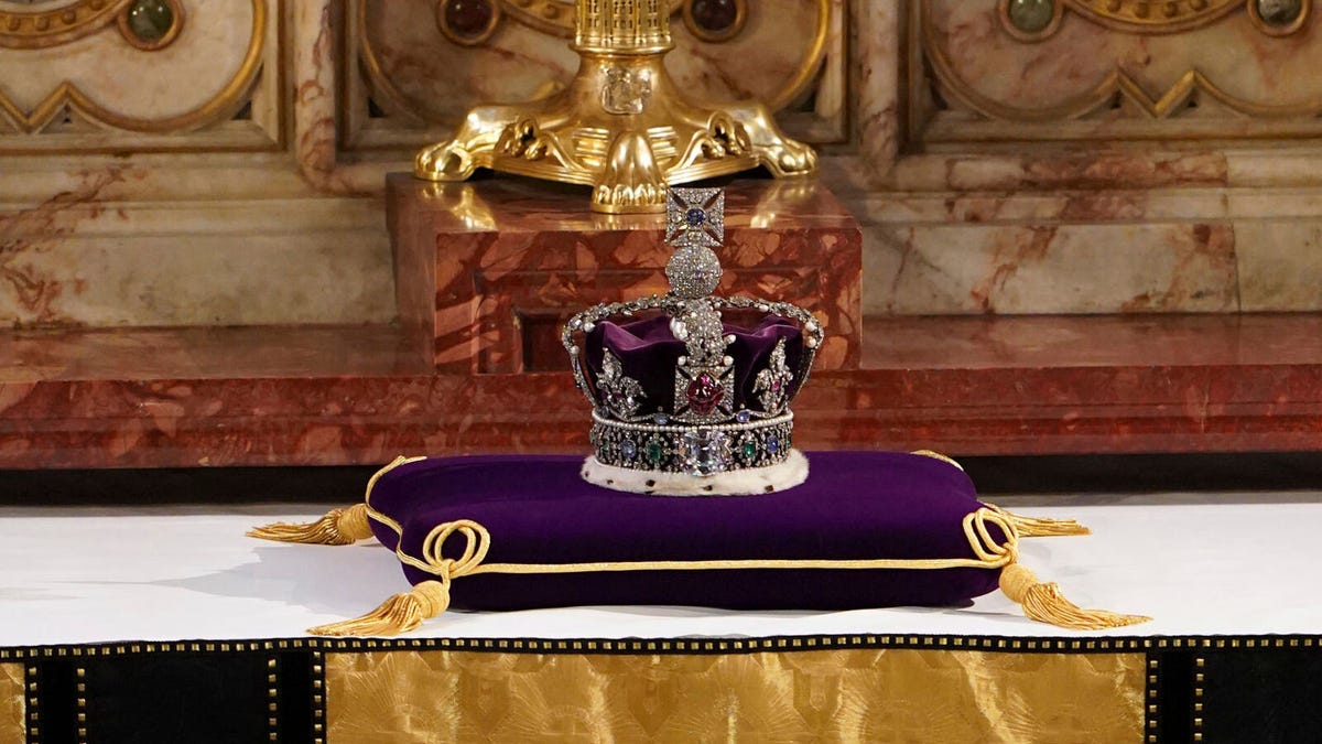 The Imperial State Crown rests on the high altar after being removed from the coffin of Britain's Queen Elizabeth II during a committal service at St George's Chapel, Windsor Castle, in Windsor, England, Monday, Sept. 19, 2022.