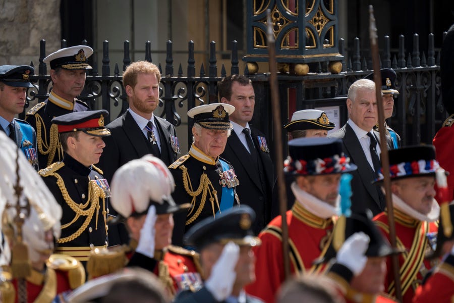 King Charles III joins the funeral procession for Queen Elizabeth II as it leaves Westminster Abbey.