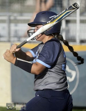Erika Niko prepares to deliver a hit for Bartlesville High School during a doubleheader sweep Sept. 19, 2022, of Tulsa Memorial.