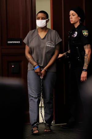 Brianna Williams enters the courtroom Tuesday at the Duval County Courthouse to learn her fate after pleading guilty to killing her 5-year-old daughter, Taylor. Judge Kevin Blazs sentenced her to life in prison.