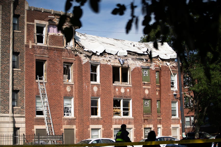 The fourth floor of an apartment building collapsed due to an explosion on the same floor at the corner of Wend Wen Avenue and N Central Avenue in Chicago's South Austin neighborhood, Tuesday, Sept. 20, 2022.