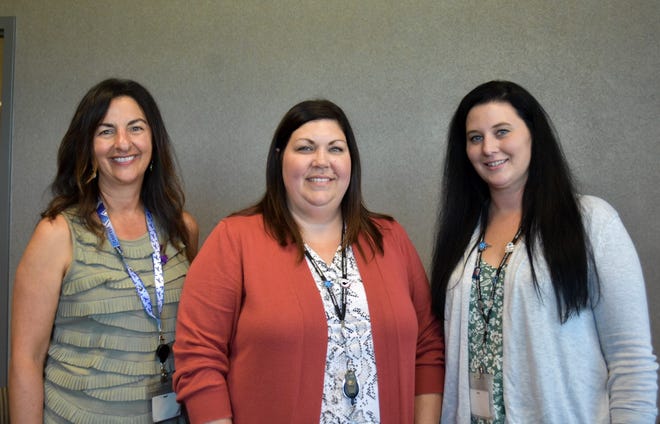 From left, OCDJFS Director Stephanie Kowal, Supervisor Jennifer Bomyea and Social Worker Sarah DeBruyne are part of a team supporting families through the Ottawa County START program.  Sandusky County is working to implement the program.