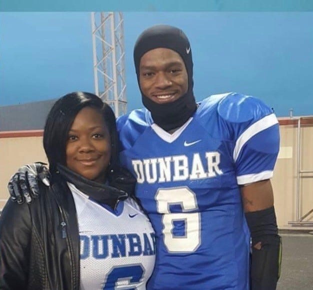 Joseph Skats, a Memphis recipient, poses with his mother, Jonida Hurt.  Scats credits Hurt with setting him up in football and motivating him to tackle his mental health