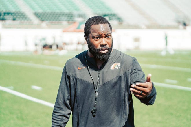 Florida A&M University Football Special Teams Coordinator Chili Davis instructs players during a fall training camp practice at Bragg Memorial Stadium in Tallahassee, Florida