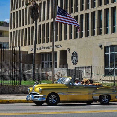 A car drives by the US embassy in Havana, Cuba on 