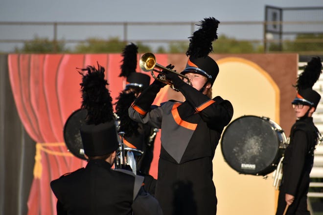 Parker DeBord belts out a trumpet solo at this month's Washington Marching Band Invitational, where the Kewanee High School band placed first.